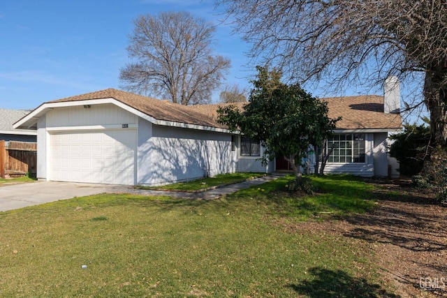 single story home featuring a front yard and a garage