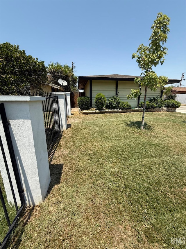2404 Belvedere Ave, Bakersfield, CA 93304 - view of yard with a gate