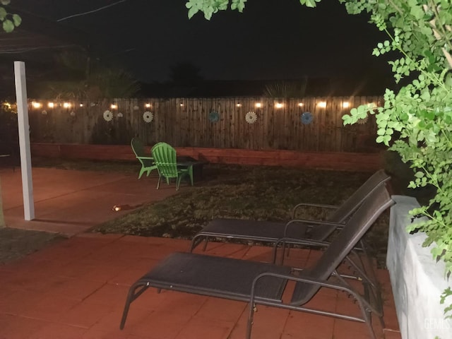 2404 Belvedere Ave, Bakersfield, CA 93304 - patio at twilight with a patio and a fenced backyard