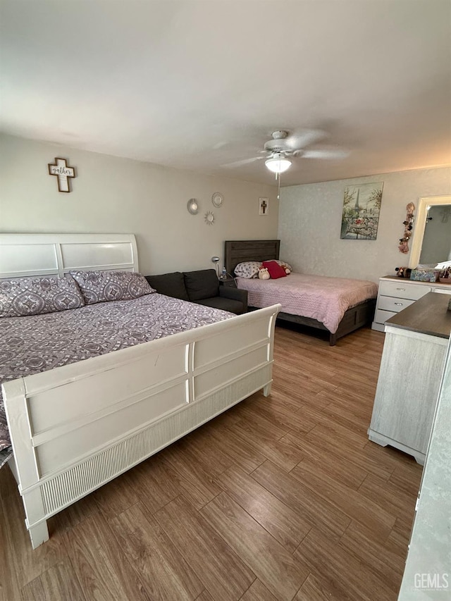 2404 Belvedere Ave, Bakersfield, CA 93304 - bedroom with wood finished floors and ceiling fan