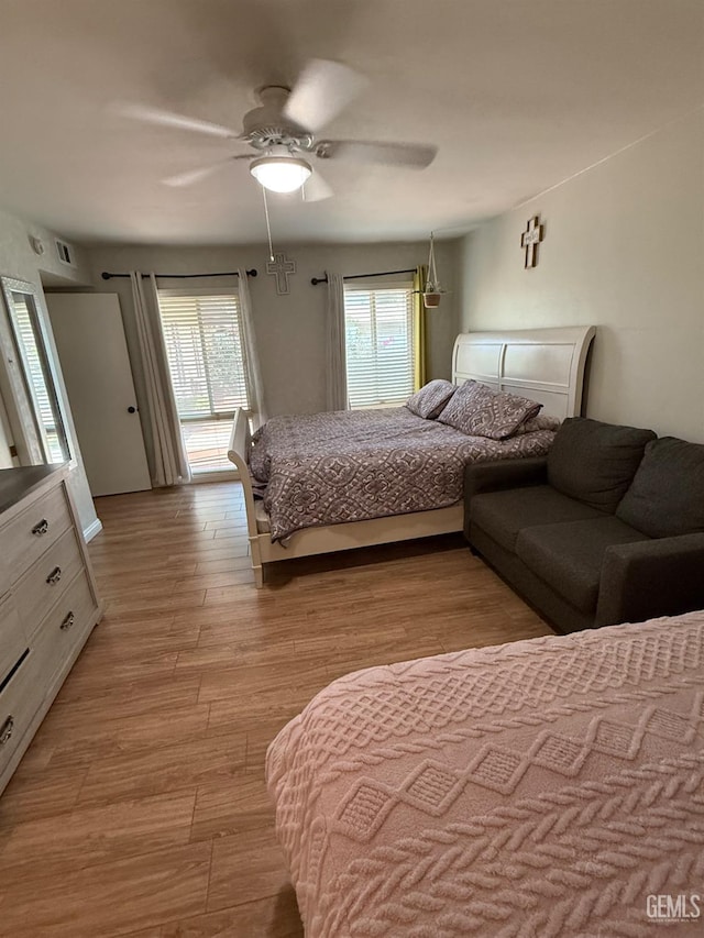 2404 Belvedere Ave, Bakersfield, CA 93304 - bedroom with wood finished floors and a ceiling fan