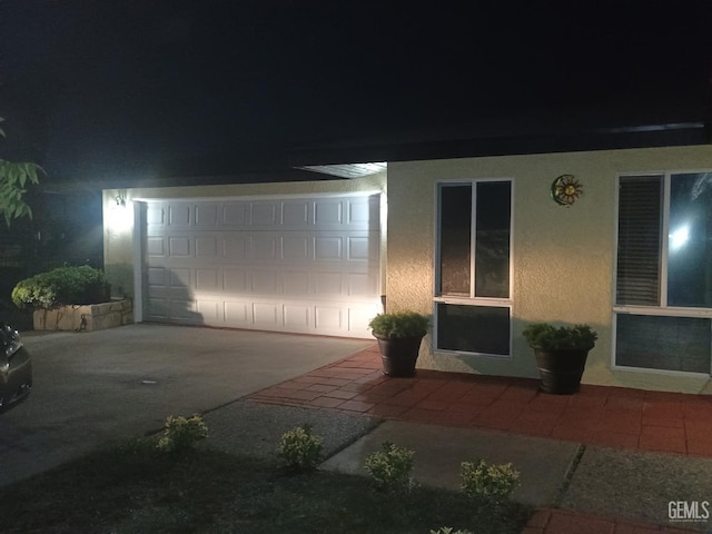 2404 Belvedere Ave, Bakersfield, CA 93304 - view of front of house featuring stucco siding and concrete driveway