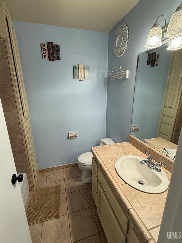 2404 Belvedere Ave, Bakersfield, CA 93304 - bathroom with vanity and tile patterned flooring