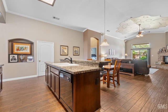 12008 Stonington St, Bakersfield, CA 93312 - kitchen featuring a sink, dishwasher, wood finished floors, crown molding, and lofted ceiling