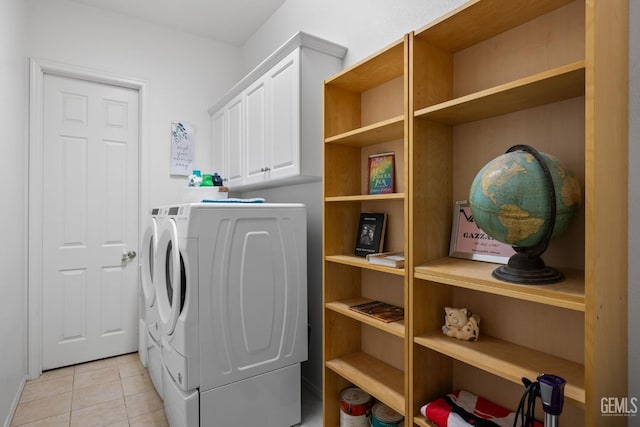 9904 Toscana Dr, Bakersfield, CA 93306 - laundry room with separate washer and dryer, light tile patterned flooring, and cabinet space