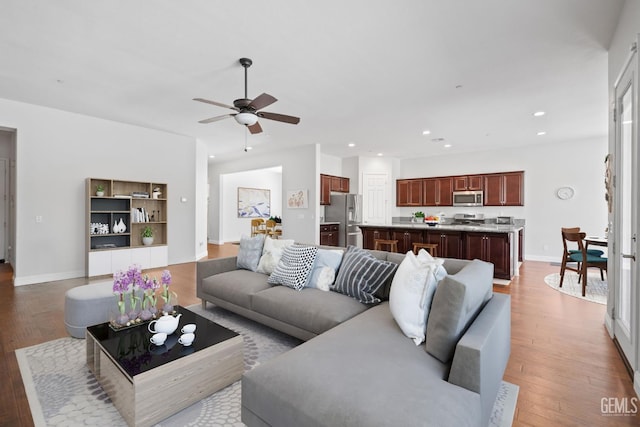 9904 Toscana Dr, Bakersfield, CA 93306 - living area with wood finished floors, ceiling fan, and recessed lighting