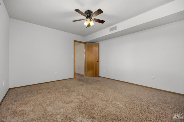 carpeted empty room with ceiling fan