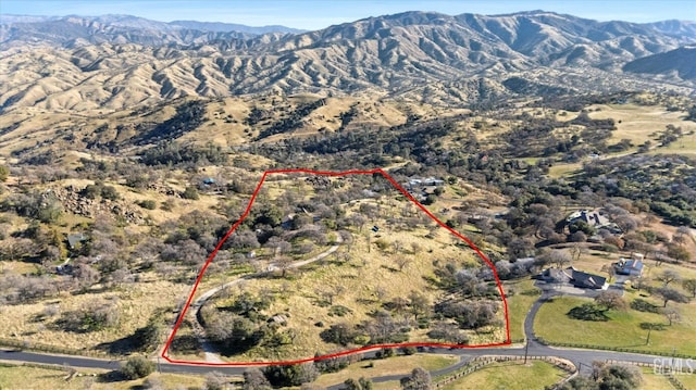 drone / aerial view featuring a mountain view