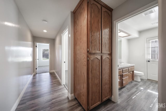 14211 Cedar Creek Ave, Bakersfield, CA 93314 - hall featuring wood finished floors and recessed lighting