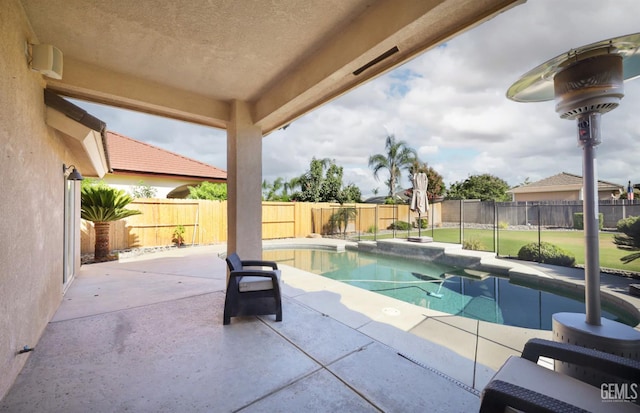 14211 Cedar Creek Ave, Bakersfield, CA 93314 - view of swimming pool featuring a patio area and a fenced backyard