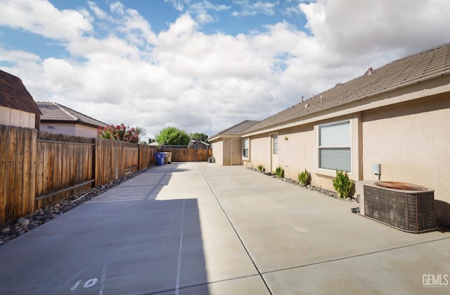 14211 Cedar Creek Ave, Bakersfield, CA 93314 - fenced backyard featuring a patio