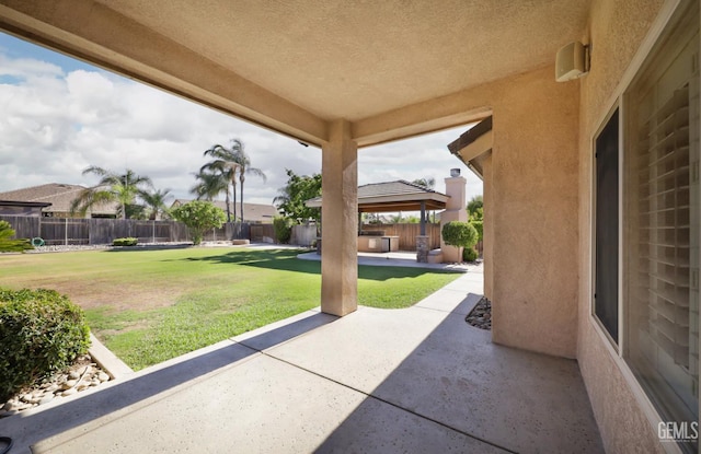 14211 Cedar Creek Ave, Bakersfield, CA 93314 - fenced backyard with a gazebo and a patio area