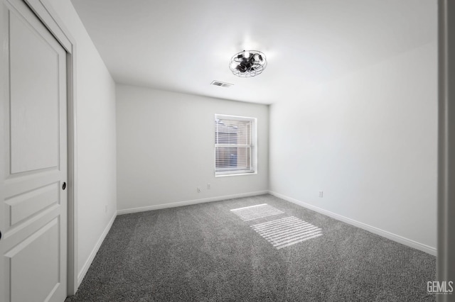 14211 Cedar Creek Ave, Bakersfield, CA 93314 - carpeted spare room with baseboards