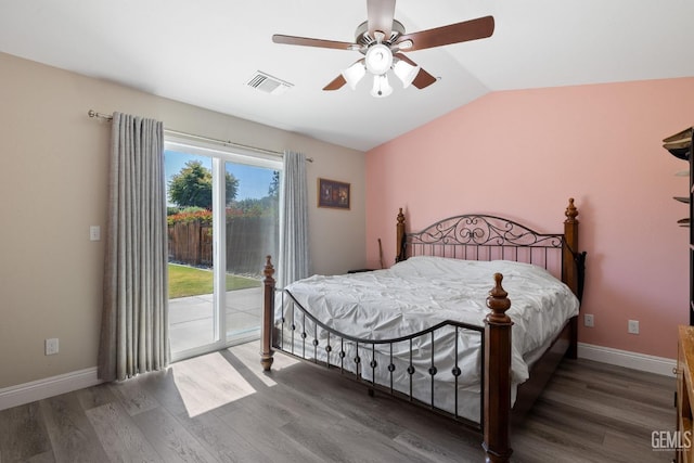 bedroom featuring access to outside, baseboards, wood finished floors, lofted ceiling, and visible vents
