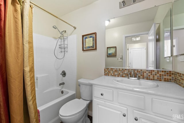 bathroom featuring vanity, shower / tub combo with curtain, backsplash, and toilet