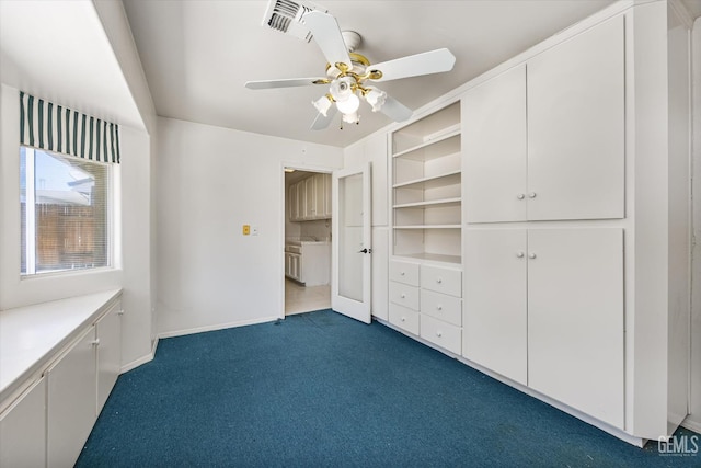 7310 Clifftop Way, Bakersfield, CA 93306 - unfurnished bedroom featuring dark colored carpet and a ceiling fan