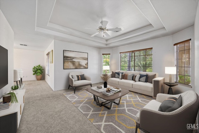 7310 Clifftop Way, Bakersfield, CA 93306 - living room featuring carpet, ceiling fan, and a tray ceiling