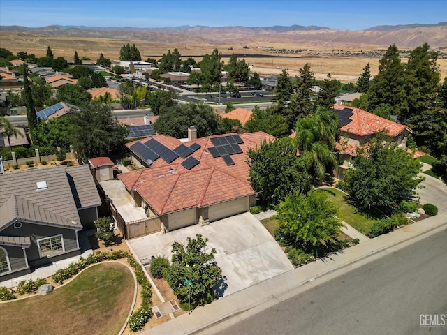 7310 Clifftop Way, Bakersfield, CA 93306 - aerial perspective of suburban area with a mountain backdrop