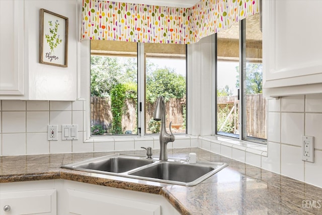 7310 Clifftop Way, Bakersfield, CA 93306 - kitchen with white cabinets and backsplash