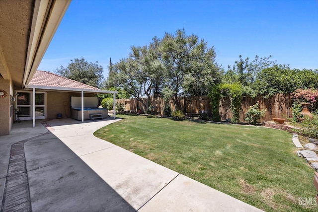7310 Clifftop Way, Bakersfield, CA 93306 - fenced backyard featuring a hot tub and a patio area
