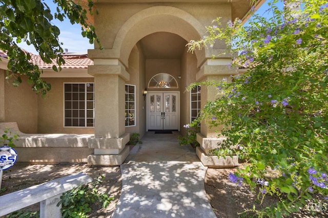 7310 Clifftop Way, Bakersfield, CA 93306 - doorway to property with stucco siding and a tile roof