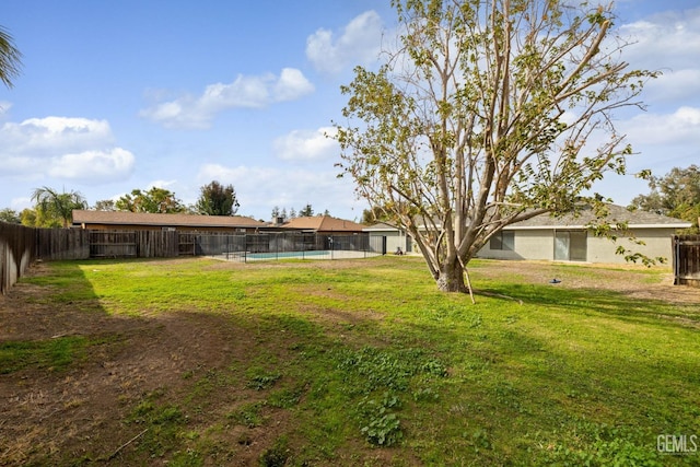 view of yard featuring a fenced backyard and a fenced in pool