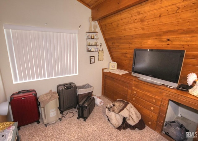 bedroom with light carpet, vaulted ceiling, and wood ceiling