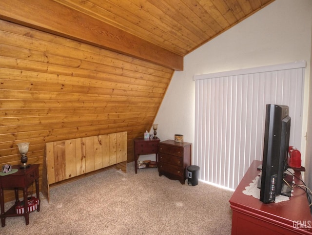 additional living space featuring carpet floors, vaulted ceiling with beams, and wooden ceiling