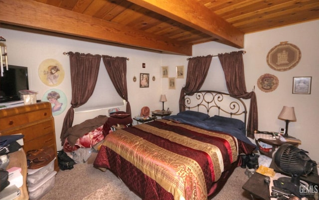 bedroom with carpet and beamed ceiling