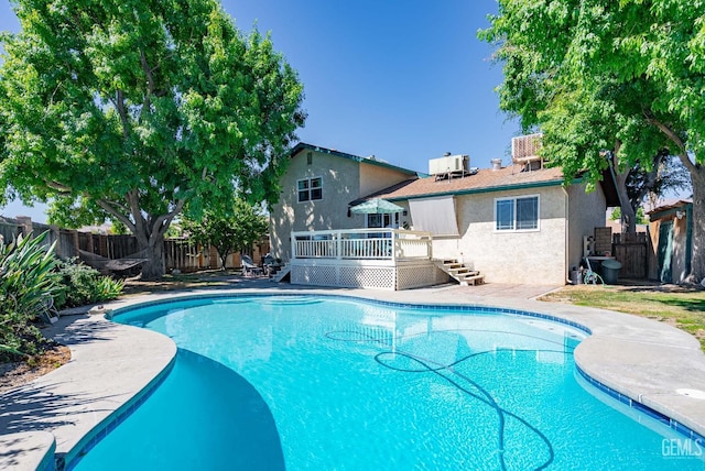 510 Sierra St, Taft, CA 93268 - view of swimming pool featuring a deck and a fenced backyard