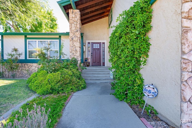 510 Sierra St, Taft, CA 93268 - doorway to property with stucco siding and stone siding
