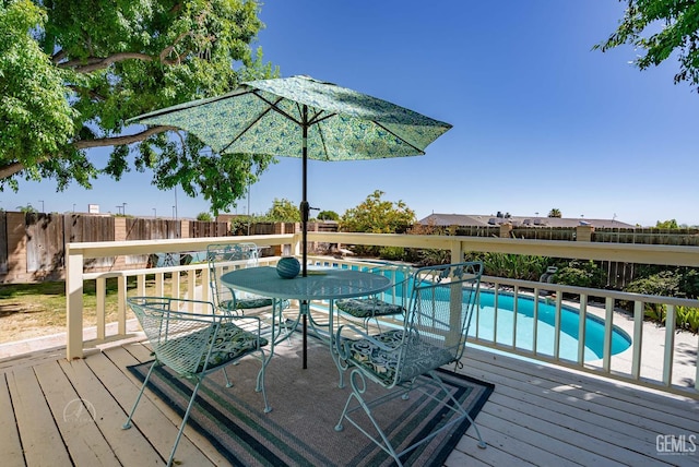 510 Sierra St, Taft, CA 93268 - wooden terrace featuring a fenced backyard and outdoor dining space