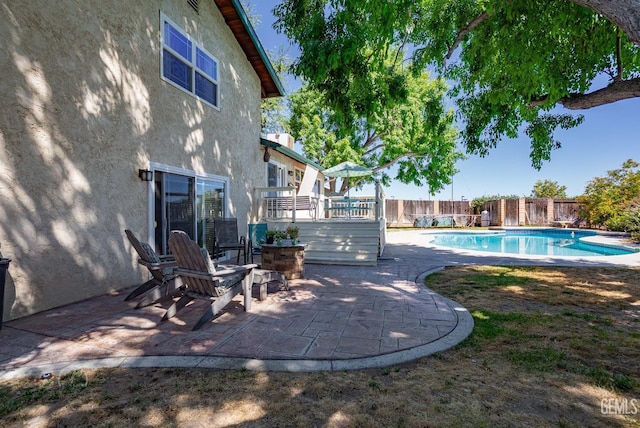 510 Sierra St, Taft, CA 93268 - view of pool featuring a fenced backyard, a deck, and a patio