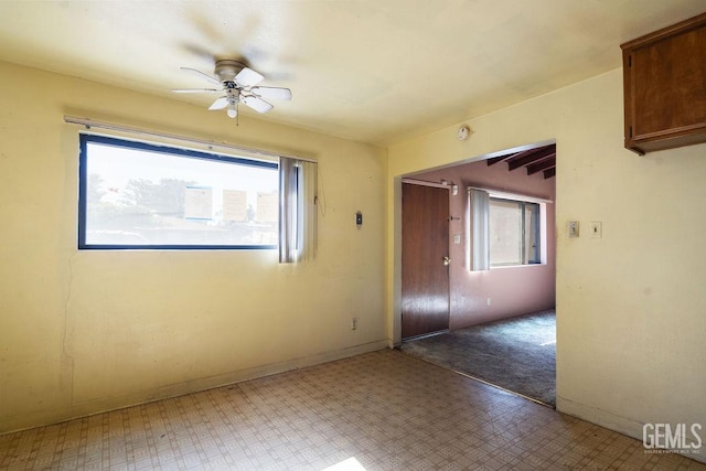 1857 Gaston St, Wasco, CA 93280 - unfurnished room with a ceiling fan, tile patterned floors, and baseboards