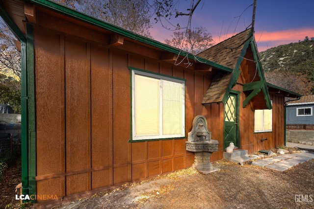 view of property exterior at dusk