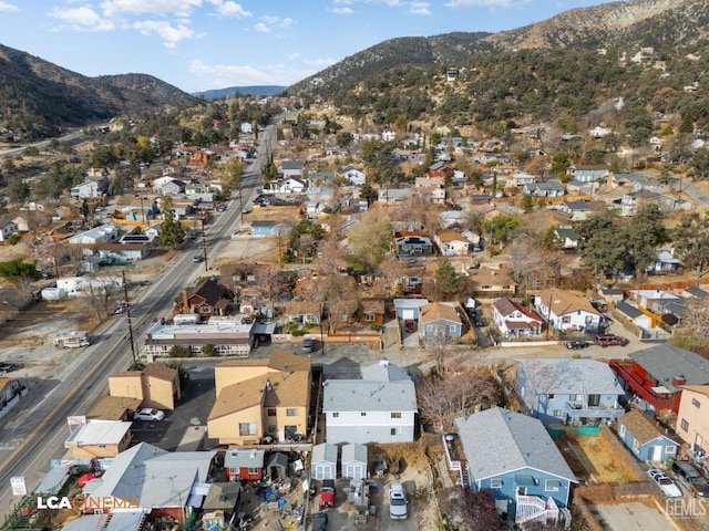 drone / aerial view featuring a mountain view