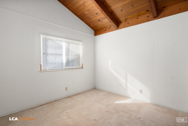 spare room featuring vaulted ceiling with beams, light colored carpet, and wood ceiling