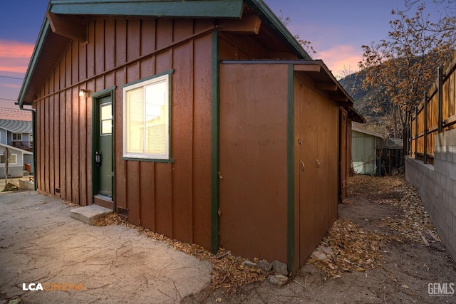 view of property exterior at dusk