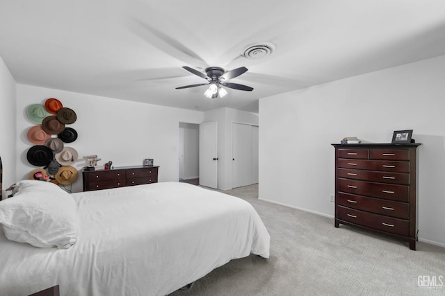 2513 Elm St, Bakersfield, CA 93301 - bedroom featuring light colored carpet, a ceiling fan, and baseboards