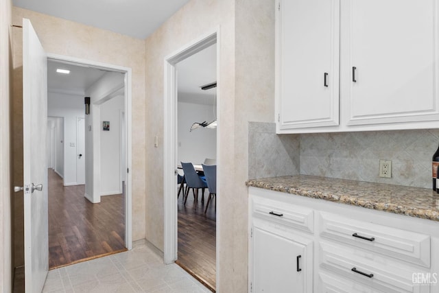 2513 Elm St, Bakersfield, CA 93301 - corridor featuring light wood-style flooring and baseboards