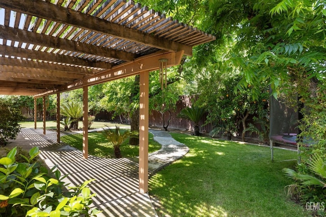 2513 Elm St, Bakersfield, CA 93301 - view of yard featuring a pergola and a patio area