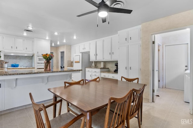 2513 Elm St, Bakersfield, CA 93301 - dining area with ceiling fan, recessed lighting, light tile patterned flooring, and washer / dryer