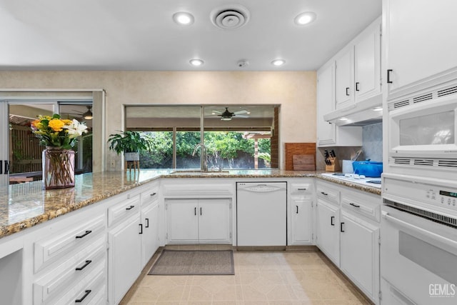 2513 Elm St, Bakersfield, CA 93301 - kitchen with white appliances, a sink, recessed lighting, ceiling fan, and tasteful backsplash