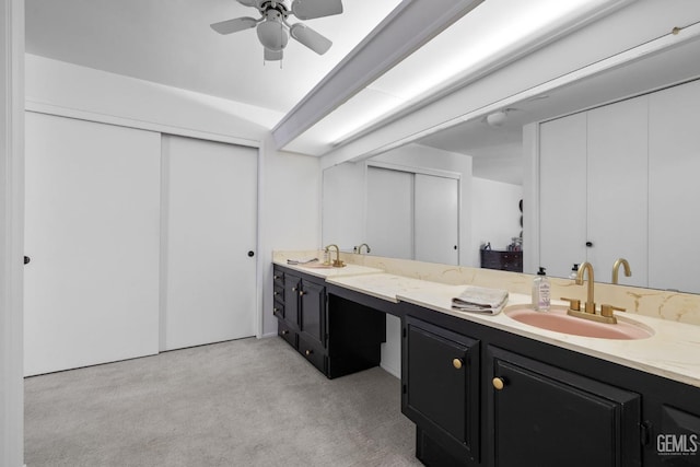 2513 Elm St, Bakersfield, CA 93301 - bathroom with carpet, a ceiling fan, and double vanity