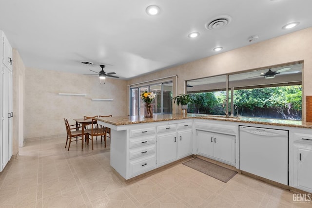 2513 Elm St, Bakersfield, CA 93301 - kitchen with white dishwasher, a ceiling fan, white cabinetry, and recessed lighting