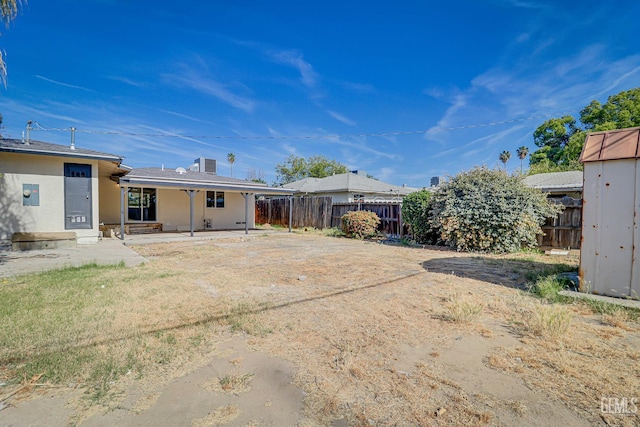1201 Quincy St, Delano, CA 93215 - back of property featuring a patio area