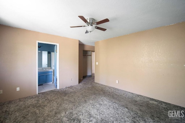 4120 Willow Trl, Frazier Park, CA 93225 - unfurnished bedroom with light colored carpet, a closet, ensuite bathroom, and a ceiling fan