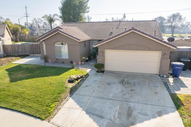 single story home with a front yard and a garage