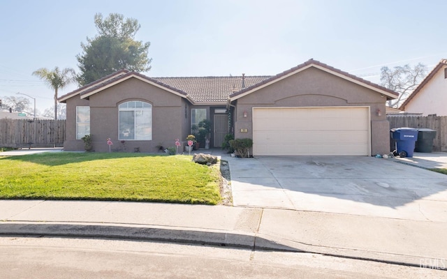 single story home featuring a garage and a front yard