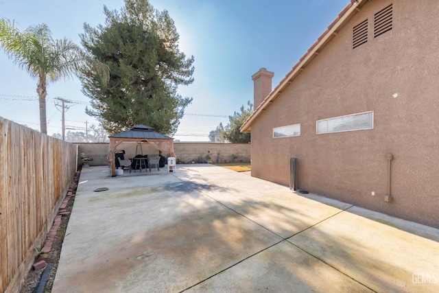 view of patio featuring a gazebo